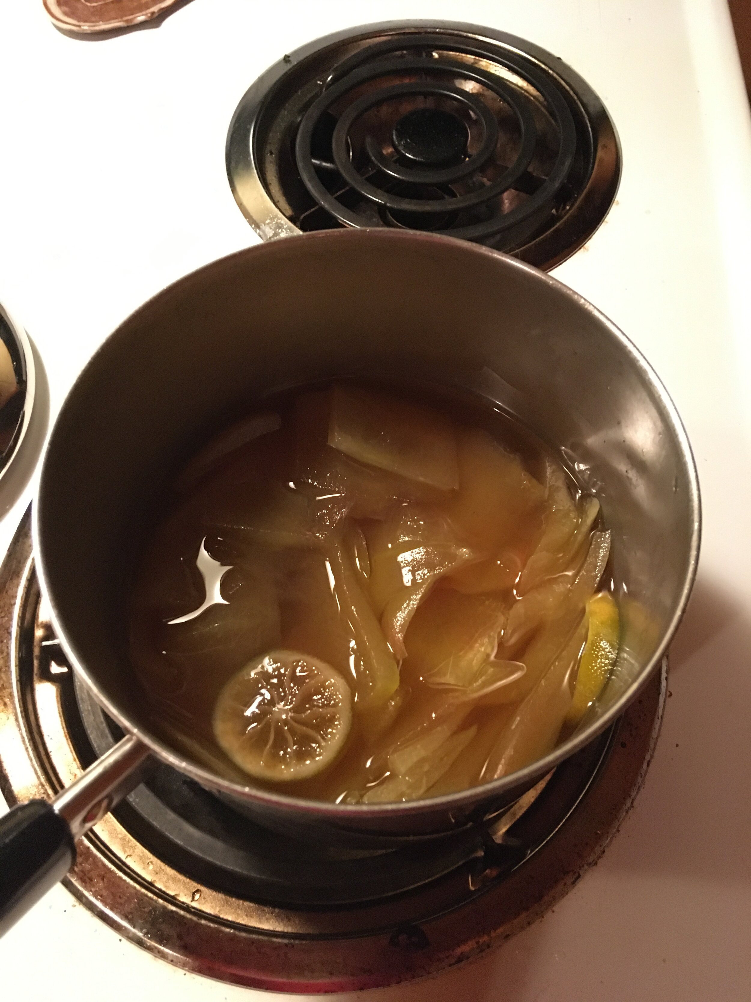 The rinds turn glassy and translucent in the pickling solution.