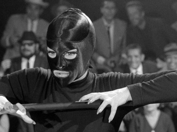 She Packs a Punch: Unmasking a Feminist History of Luchadora Moviess
